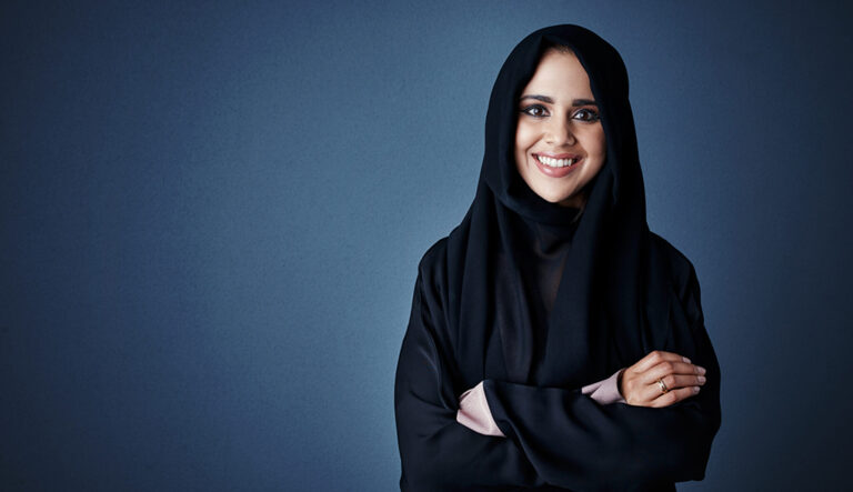 Black and white portrait of a smiling woman