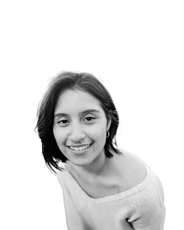 Smiling young woman in a casual outfit, black and white portrait