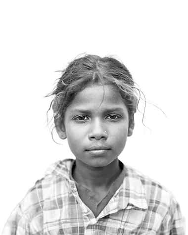 Black and white portrait of a young girl wearing a plaid shirt, looking directly at the camera with a calm and composed expression, strands of hair softly framing her face.